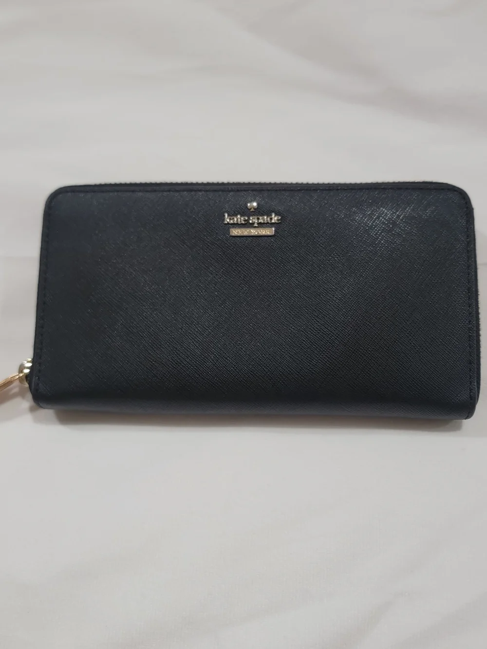 kate spade black zip-around Saffiano leather wallet with gold logo